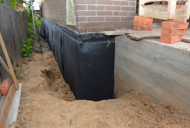 SJ Waterproofing Pros technician performing targeted Waterproofing assessment in Union, OH